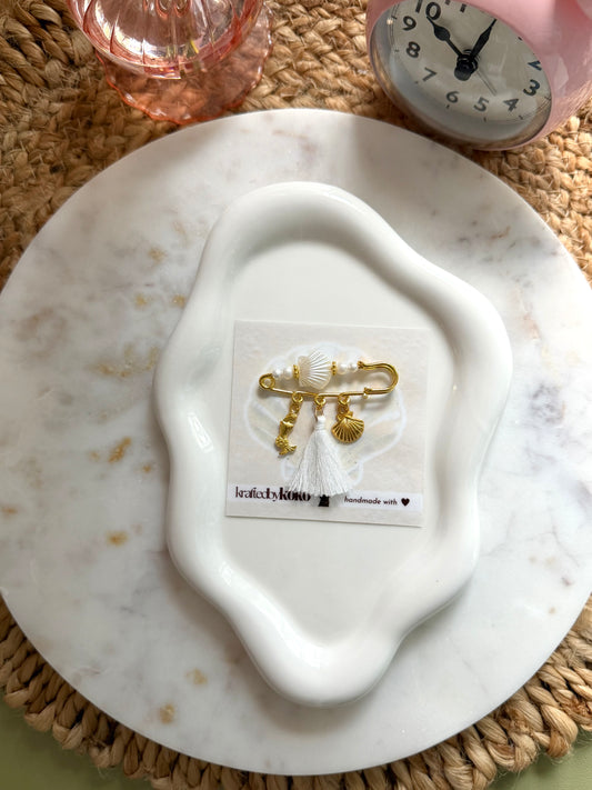 Ivory Tide Pin