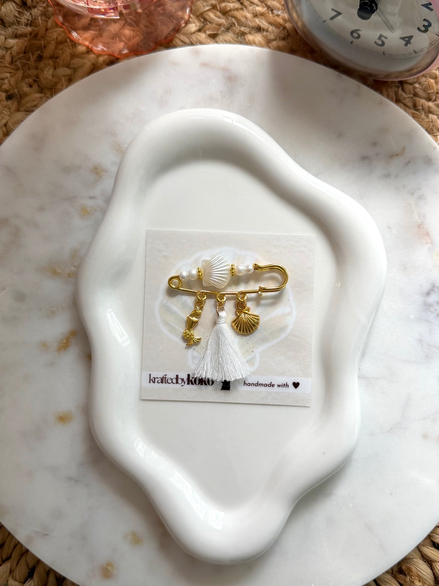 Ivory Tide Pin
